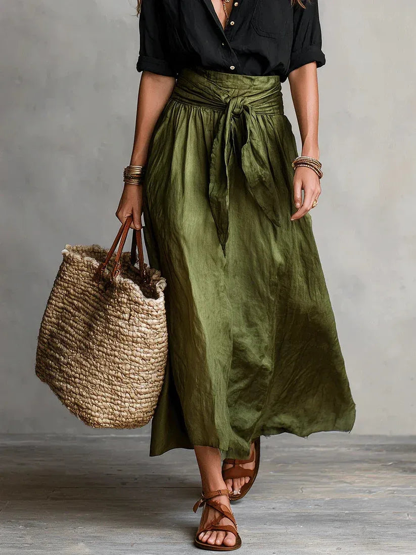 Conjunto Elegante de Dos Piezas con Blusa Negra y Falda Midi
