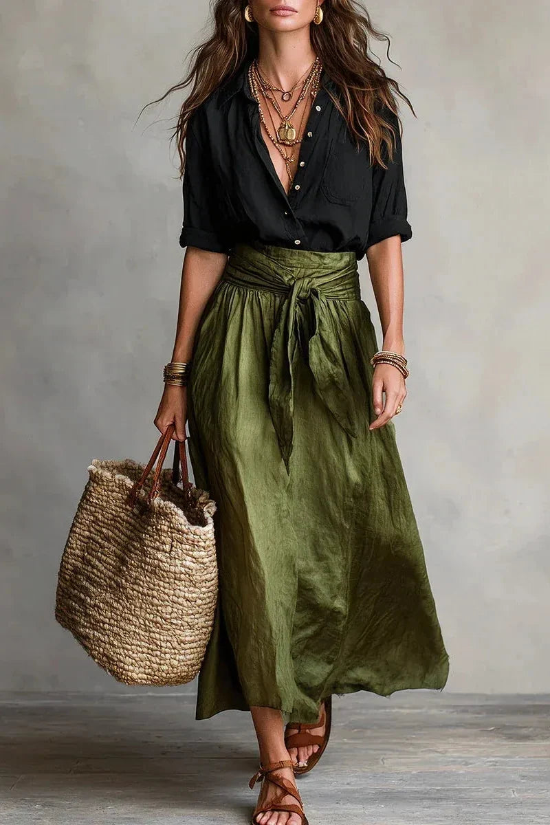 Conjunto Elegante de Dos Piezas con Blusa Negra y Falda Midi